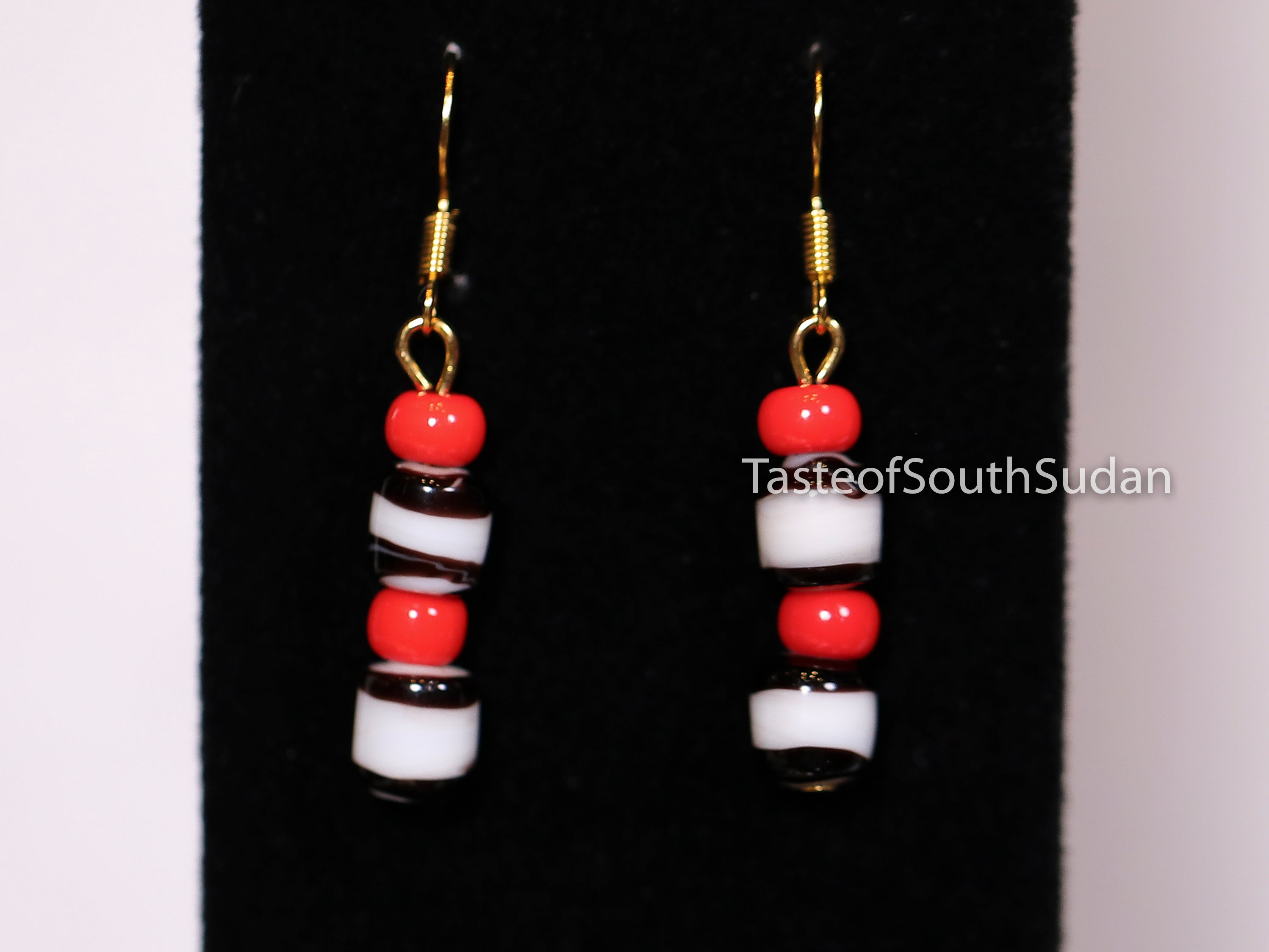 Authentic African Beaded Earrings Red, white and black glass beads.   Hand made by women in South Sudan using traditional beading techniques passed down generations.  Sudanese earrings.
