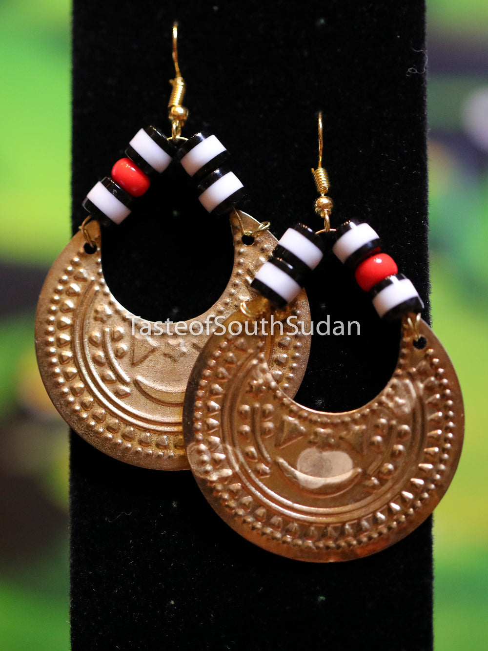 Authentic African Beaded Earrings Red, white and black glass beads and gold moon charm.  Hand made by women in South Sudan using traditional beading techniques passed down generations.  Sudanese hilal earrings.